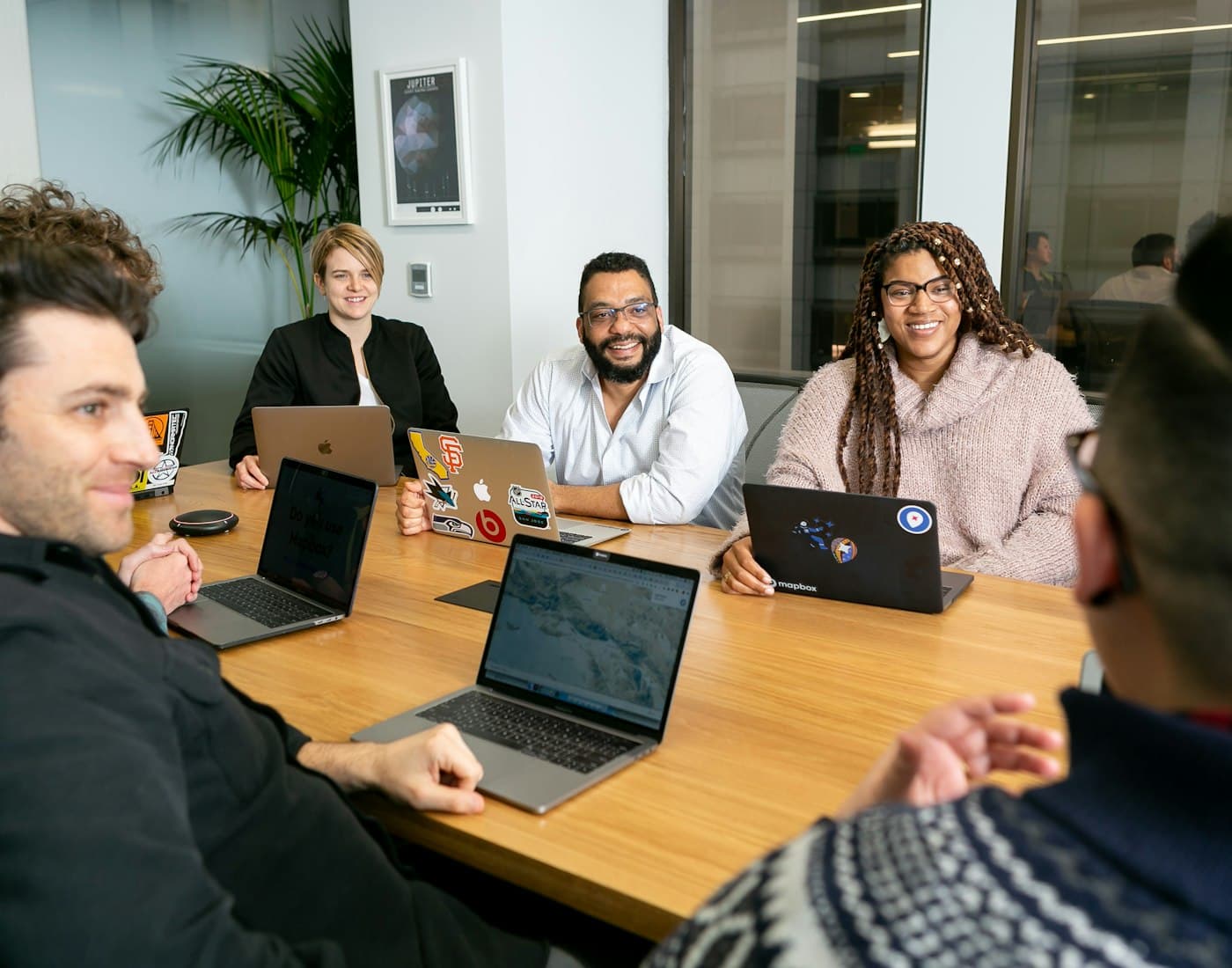 The Intellectu team collaborating around a table